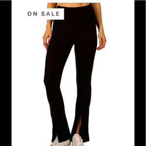 FLEECE FLARED LEG SLIT FRONT LEGGING
SUZETTE COLLECTION. ONE SIZE FITS MOST NWT